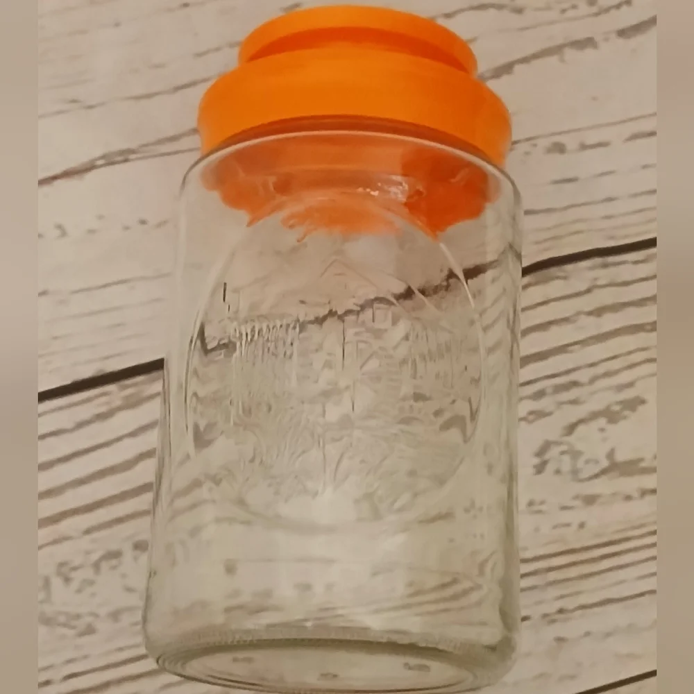 Vintage 1970s Glass Tang Jar with Orange Lid Wheel